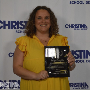 Photo of Jaclyn Coughlin Teacher of the Year Gallaher ES with award